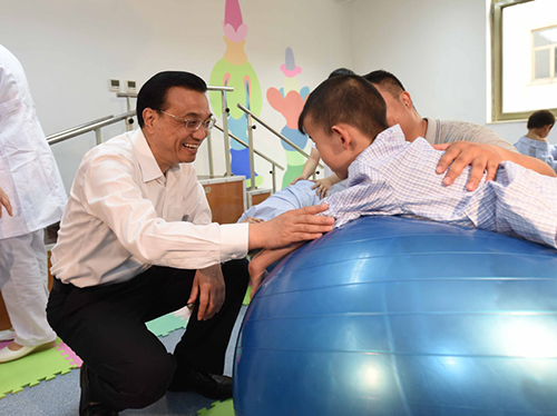 這三年，總理牽掛的殘疾人群體，迎來哪些暖政？