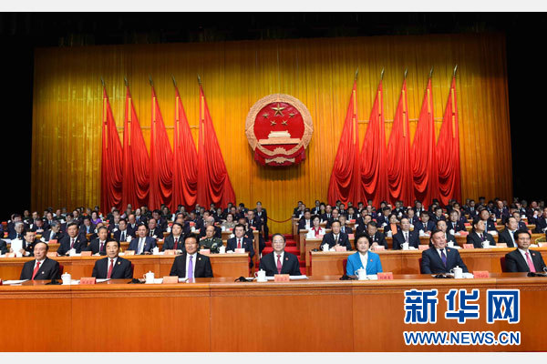 10月1日，慶祝中華人民共和國成立66周年暨新疆維吾爾自治區(qū)成立60周年大會在新疆人民會堂隆重舉行。 新華社記者 饒愛民 攝