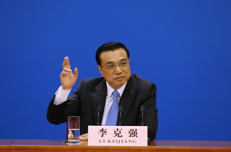 3月15日，國務(wù)院總理李克強在北京人民大會堂與中外記者見面，并回答記者提問。 新華社記者 沈伯韓 攝