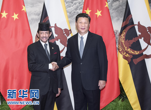 9月13日，國(guó)家主席習(xí)近平在北京人民大會(huì)堂同文萊蘇丹哈桑納爾舉行會(huì)談。 新華社記者 李濤 攝