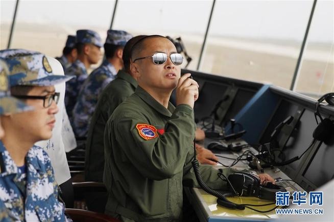 (改革先鋒風采·圖文互動)(1)戴明盟:航母戰(zhàn)斗機英雄試飛員
