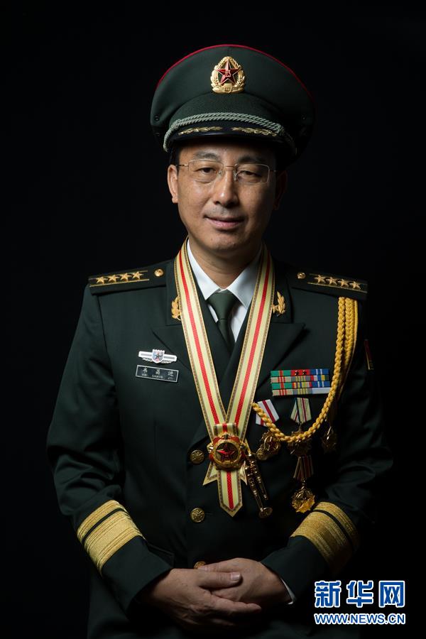 （改革先鋒風(fēng)采&middot;圖文互動(dòng)）戰(zhàn)斗英雄韋昌進(jìn)：甘做鋼鐵長城一塊磚