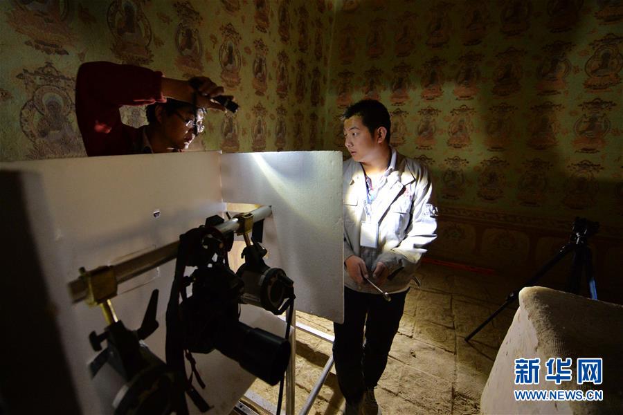 （時(shí)代先鋒&middot;圖文互動(dòng)）（16）此生不悔入沙海 勇?lián)厝问家?jiàn)金&mdash;&mdash;敦煌研究院文物保護(hù)利用群體群像