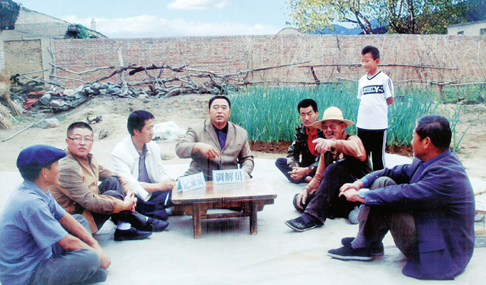 調(diào)解&ldquo;家長(zhǎng)里短，雞毛蒜皮&rdquo;的小事情是李培斌從事的大事業(yè)