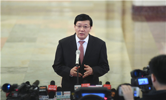 全國社?；鹄硎聲硎麻L樓繼偉接受采訪