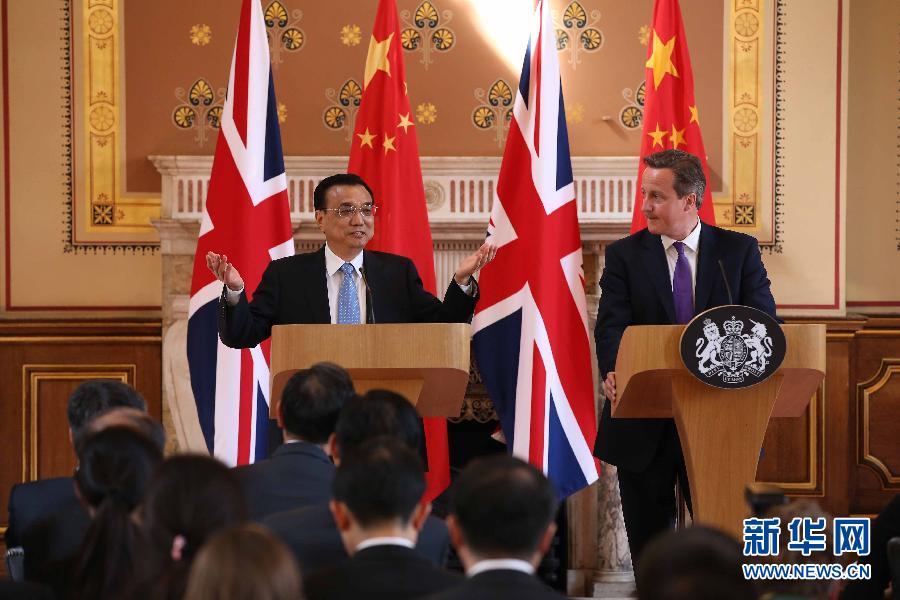 6月17日，國務院總理李克強同英國首相卡梅倫在倫敦舉行中英總理年度會晤后共同會見記者。新華社記者 龐興雷 攝