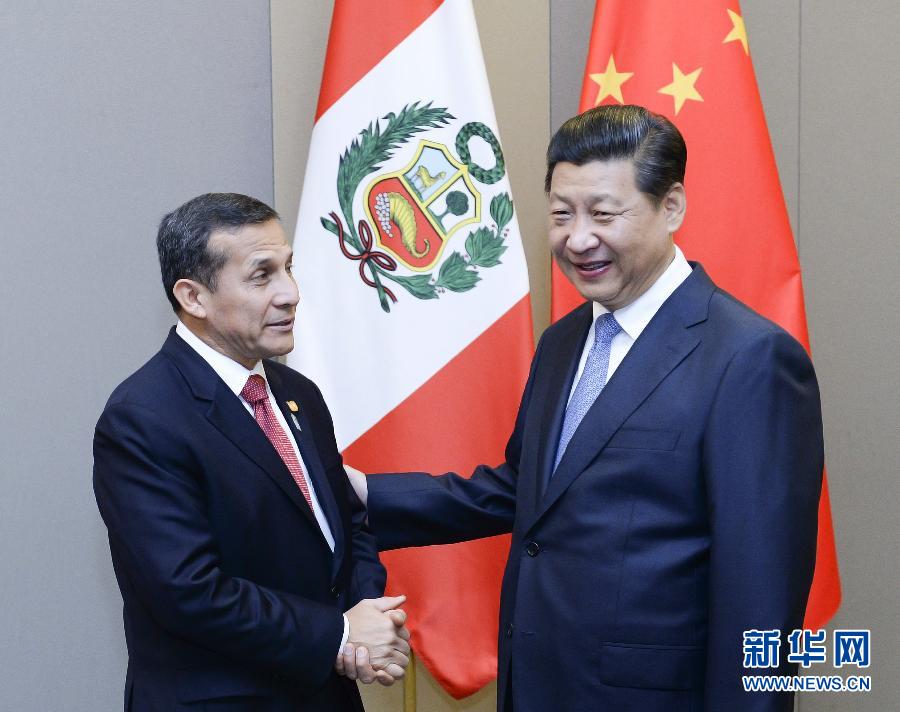 7月16日，國家主席習(xí)近平在巴西首都巴西利亞會見秘魯總統(tǒng)烏馬拉。新華社記者 劉建生 攝 