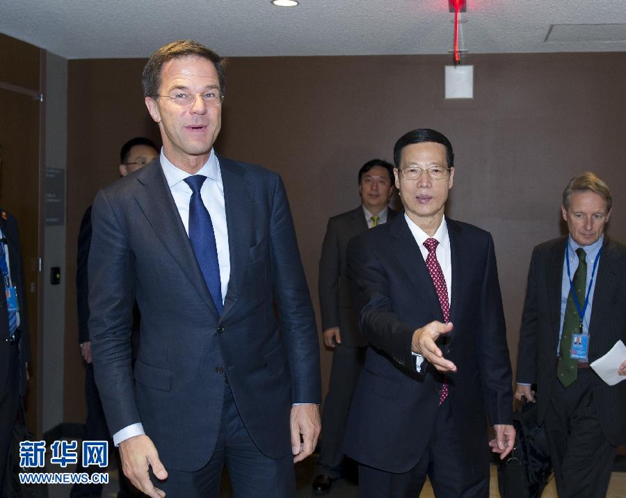 9月23日，出席聯(lián)合國氣候峰會的國家主席習(xí)近平特使、國務(wù)院副總理張高麗在紐約聯(lián)合國總部會見荷蘭首相呂特。 新華社記者 王曄 攝 