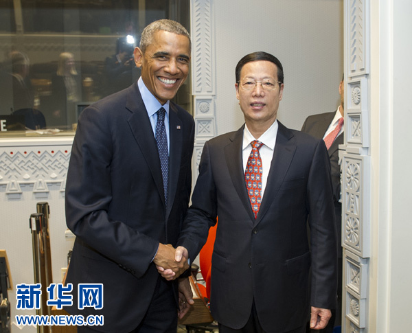 9月23日，國家主席習(xí)近平特使、國務(wù)院副總理張高麗在紐約會見出席聯(lián)合國氣候峰會的美國總統(tǒng)奧巴馬。 新華社記者王曄攝