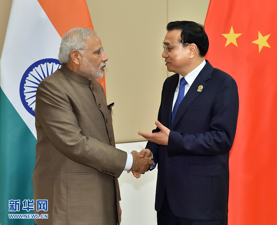 11月13日，中國(guó)國(guó)務(wù)院總理李克強(qiáng)在緬甸內(nèi)比都會(huì)見(jiàn)印度總理莫迪。 新華社記者 李濤 攝