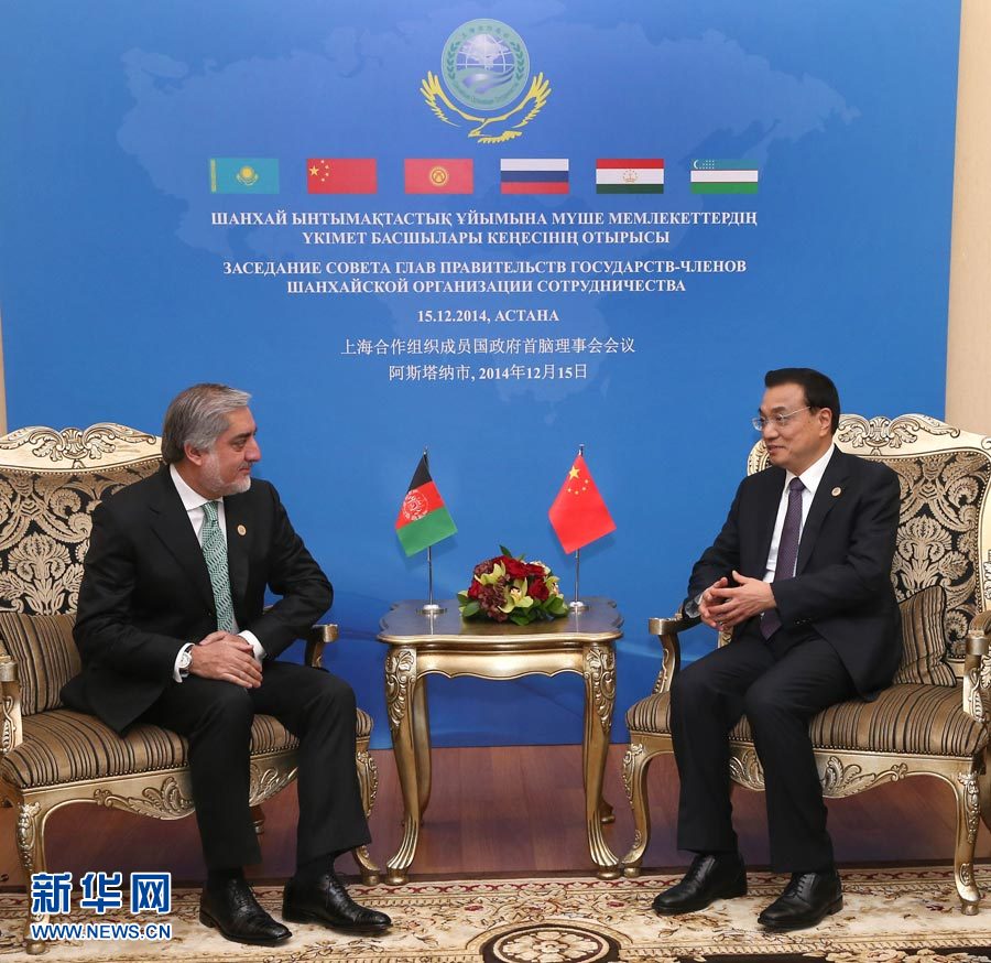 12月15日，中國國務(wù)院總理李克強在阿斯塔納會見阿富汗首席執(zhí)行官阿卜杜拉。 新華社記者 龐興雷 攝