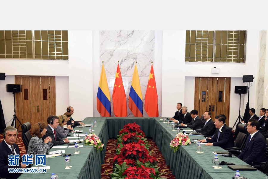 11月18日，國家主席習近平在菲律賓馬尼拉會見哥倫比亞總統(tǒng)桑托斯。 新華社記者 饒愛民 攝