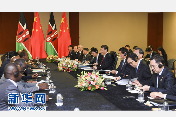 12月3日，國(guó)家主席習(xí)近平在約翰內(nèi)斯堡會(huì)見肯尼亞總統(tǒng)肯雅塔。新華社記者 謝環(huán)馳 攝