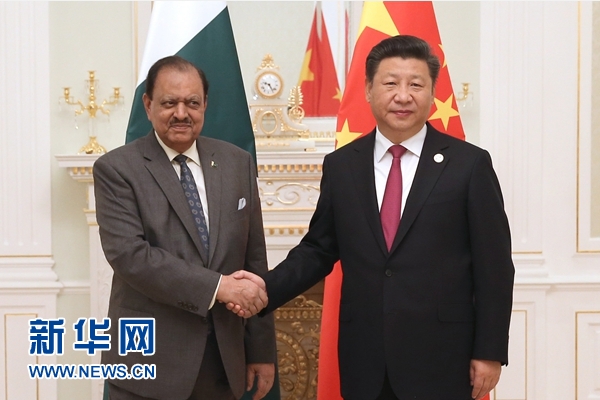 6月23日，國家主席習近平在塔什干會見巴基斯坦總統(tǒng)侯賽因。新華社記者馬占成攝