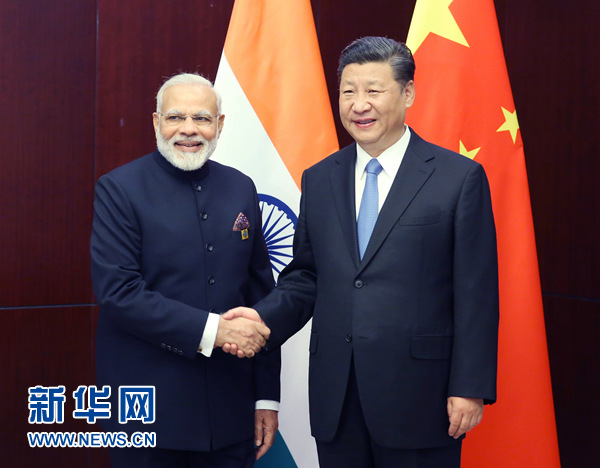 6月9日，國家主席習(xí)近平在阿斯塔納會見印度總理莫迪。 新華社記者姚大偉 攝