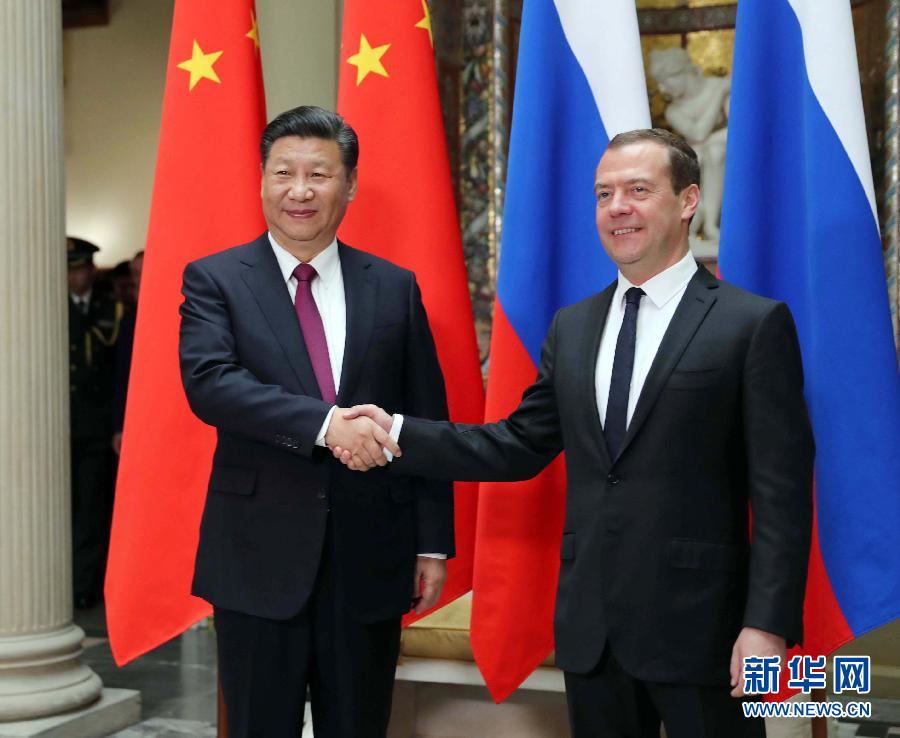 7月4日，國家主席習近平在莫斯科會見俄羅斯總理梅德韋杰夫。新華社記者 劉衛(wèi)兵 攝