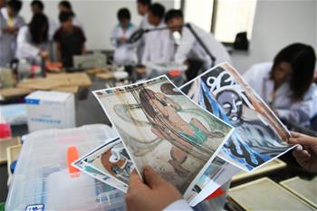 &ldquo;壁畫(huà)醫(yī)生&rdquo;敦煌受訓(xùn)